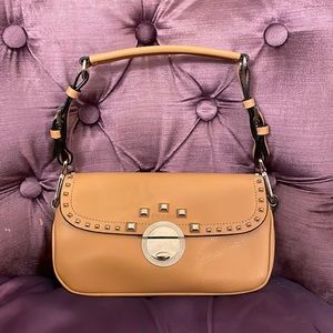 Silver studded leather handbag